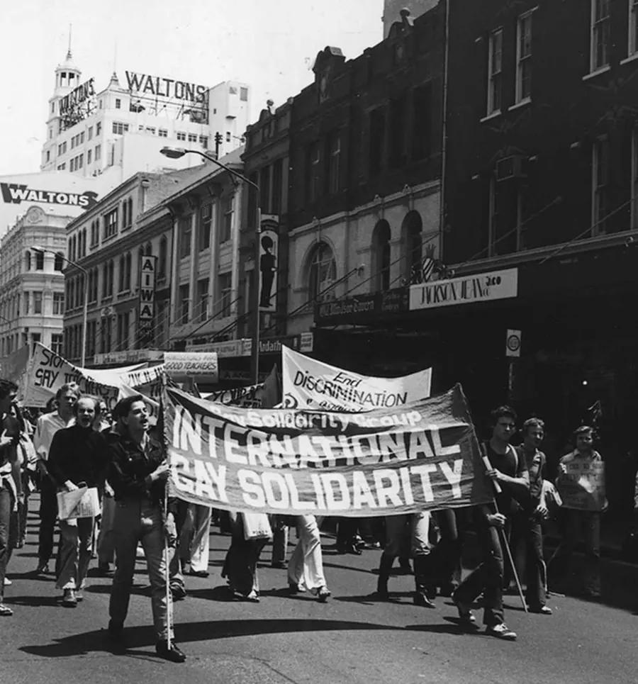 Marchers behind an International Gay Solidarity banner on a Sydney street in 1978.